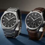 A professional photograph of two Tissot watches side-by-side on a dark blue surface. The watch on the left is a Tissot PRX with an integrated steel bracelet and a textured dial. The watch on the right is a Tissot Gentleman with a brown leather strap and a smooth black dial.