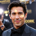 Tyriq Withers smiles confidently on a red carpet, with camera flashes reflecting off him, surrounded by photographers. He is a rising Hollywood actor making significant contributions to film and television.