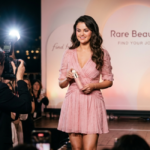 Selena Gomez wearing a structured bubblegum-pink Prada mini dress at the True to Myself foundation launch in West Hollywood.