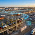 Aerial view of Toyota Motor Manufacturing Texas with automated assembly lines building pickup trucks at sunset. Digital overlays show $3.6B investment and supply chain routes between USA and Mexico facilities.